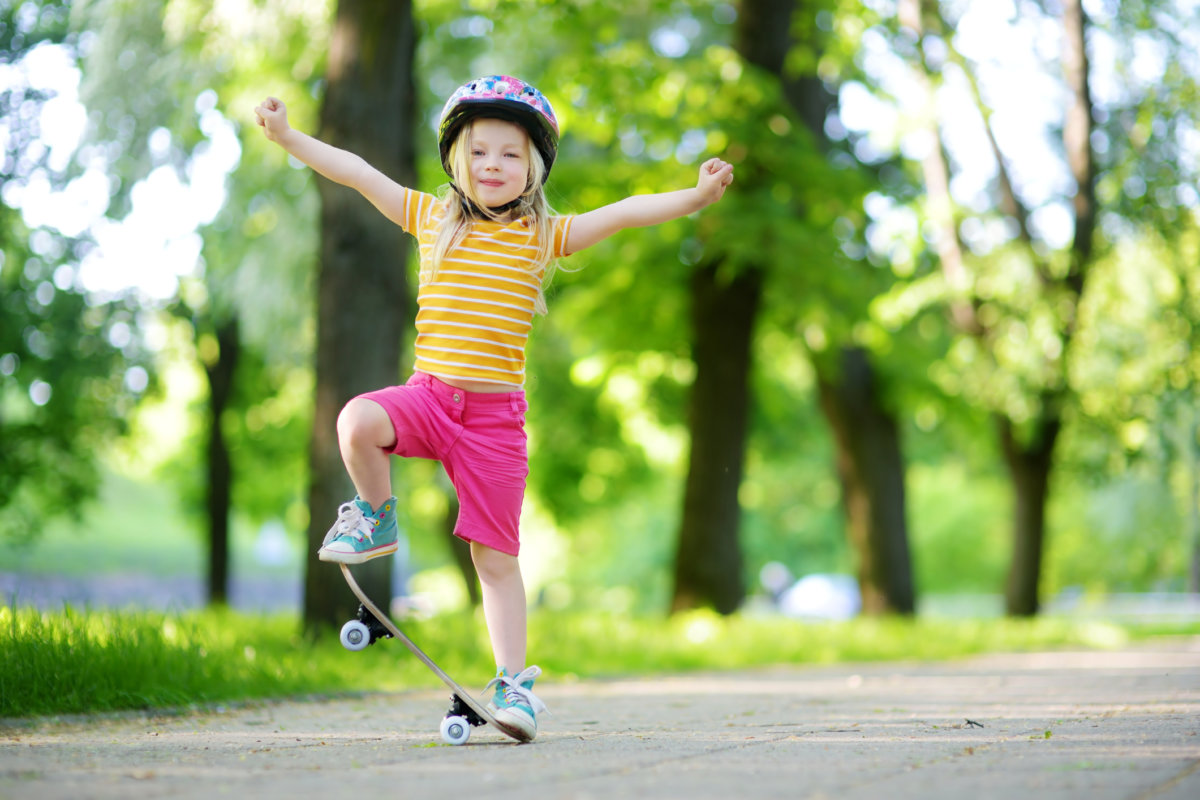Child skateboarding for family fun