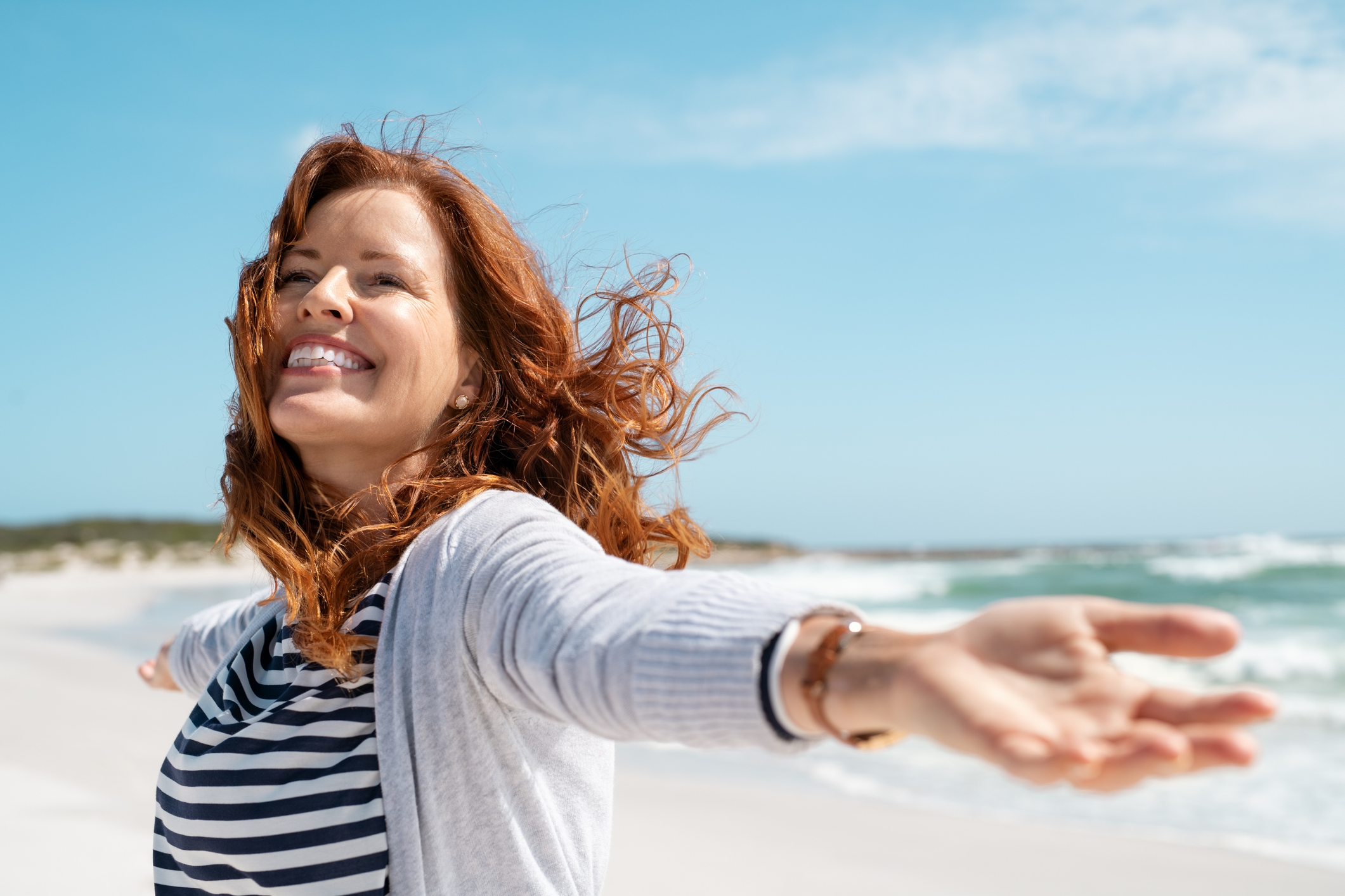 Woman enjoying her health on the beach