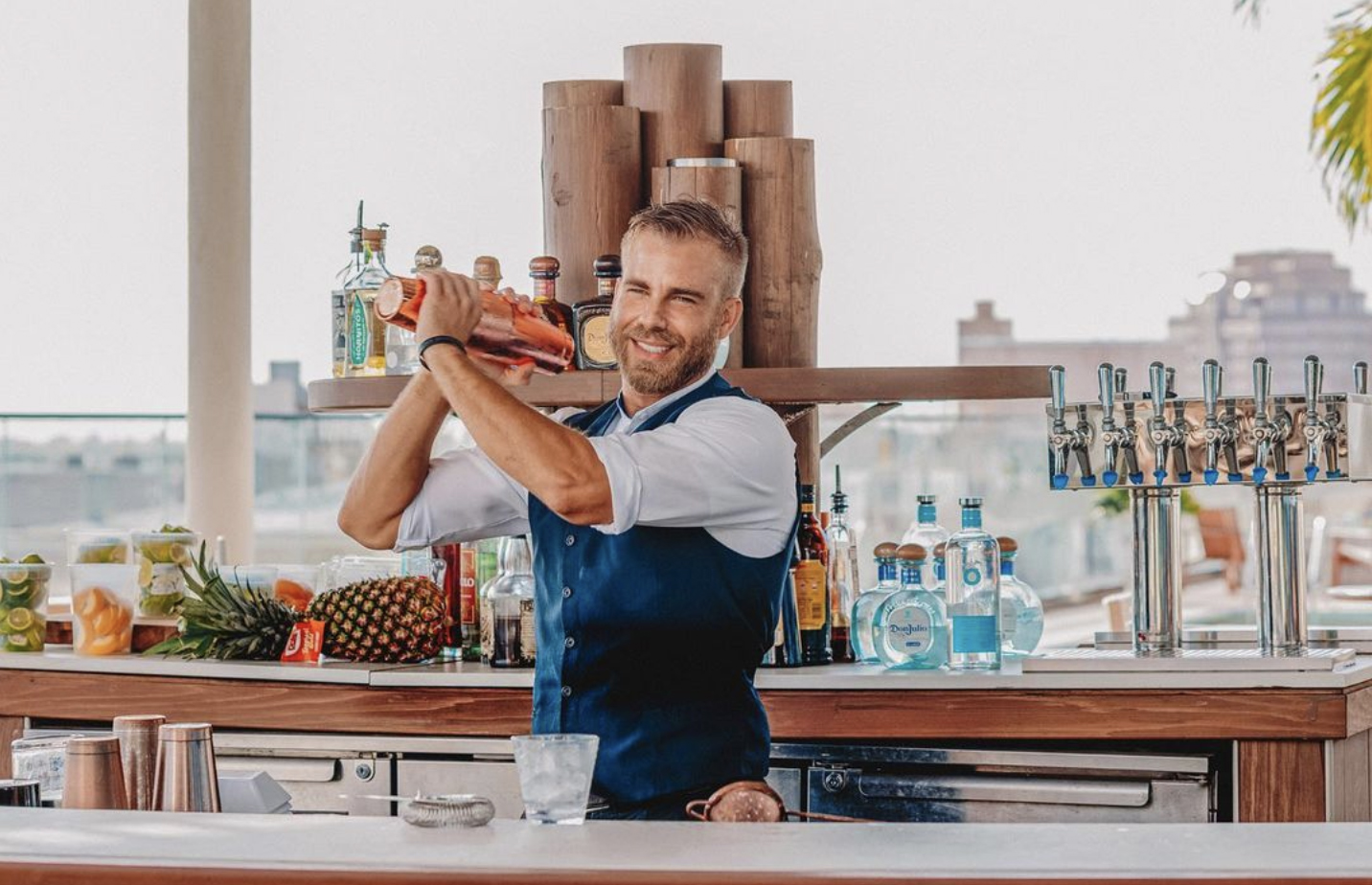 Bartender at Spruzzo Rooftop Restaurant and Bar at The Ben Hotel - one of Palm Beach's epic rooftop spots