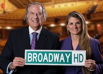 Stewart Lane and Bonnie Comley with BroadwayHD sign