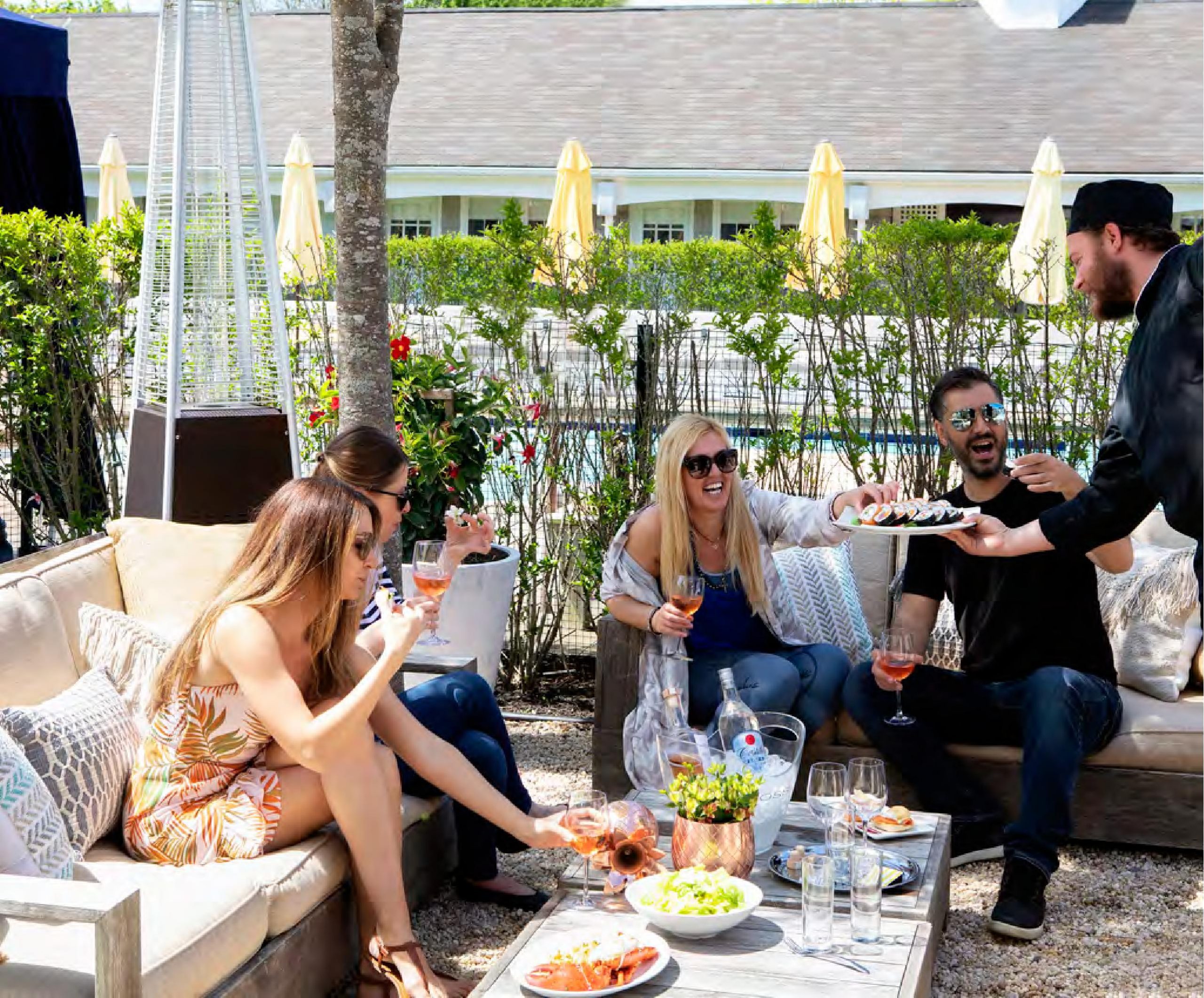 Guests enjoying NAIA at the Capri Hotel