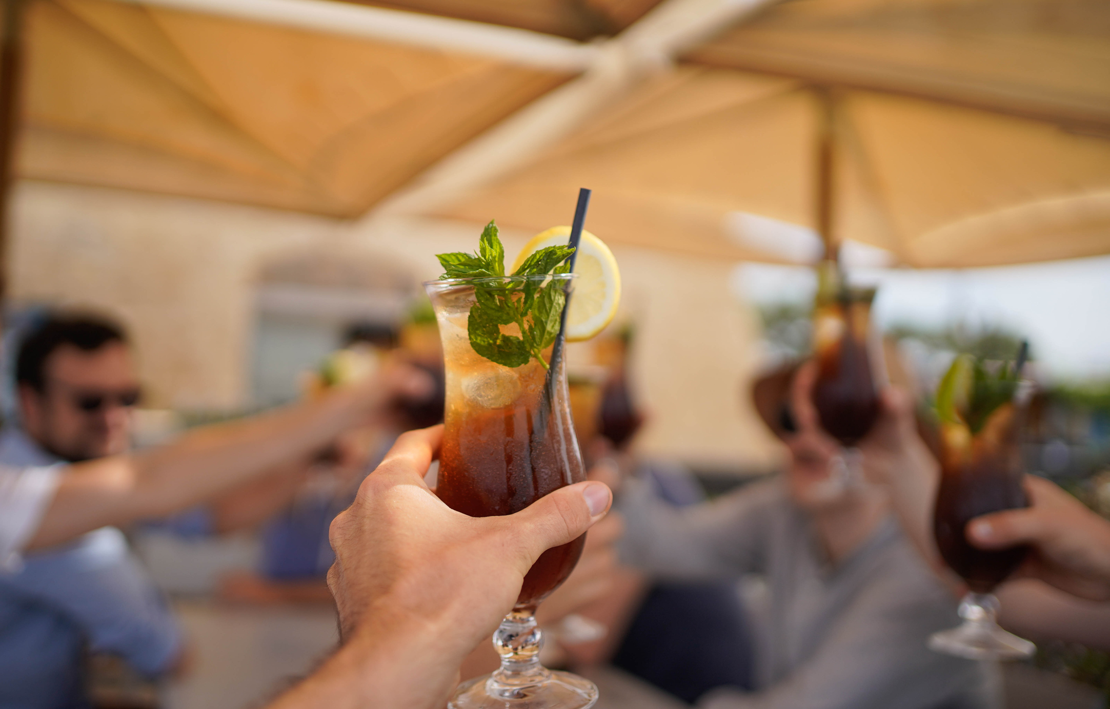 Toasting the Long Island Iced Tea cocktail