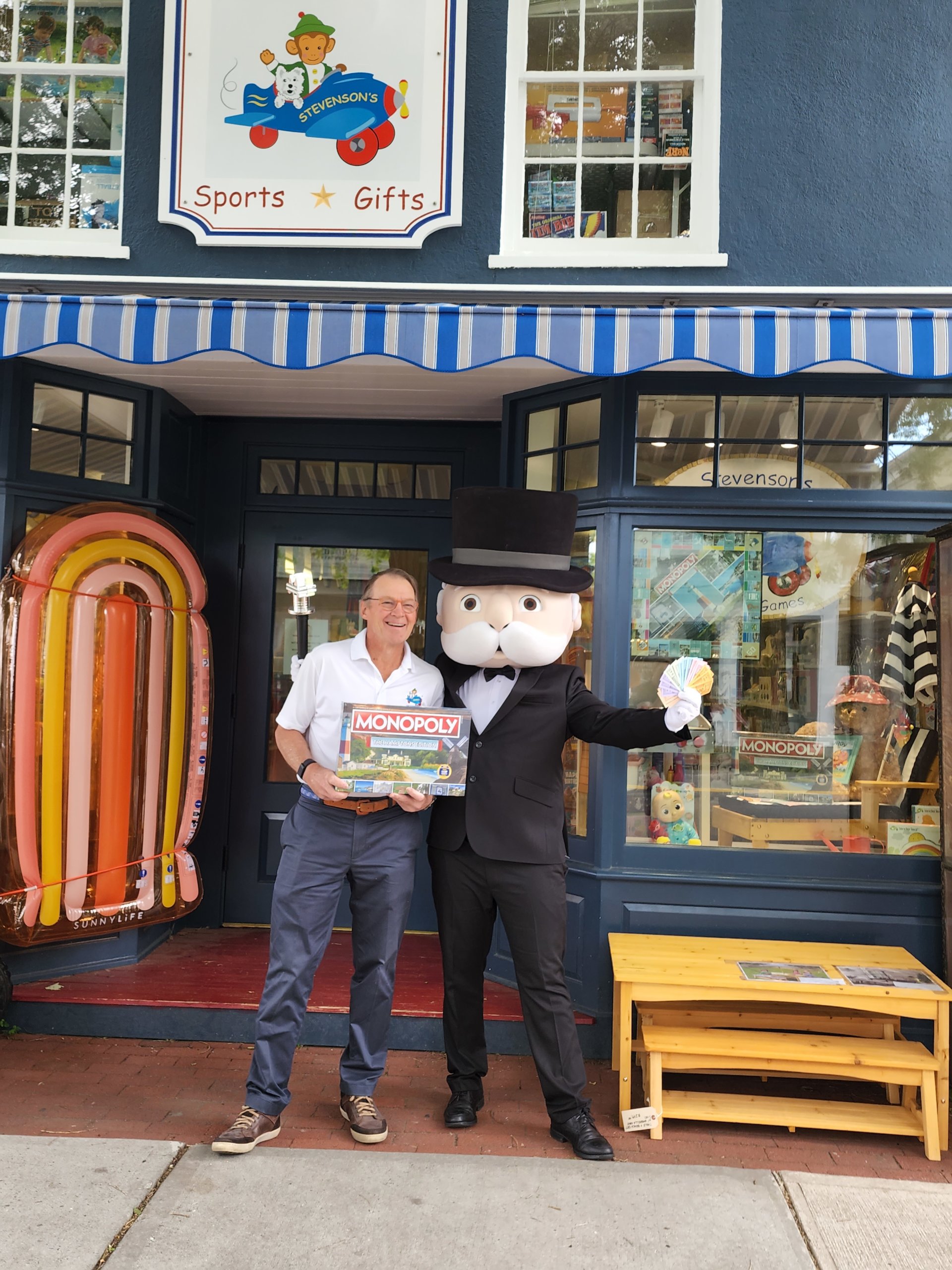 Roy Stevenson with Mr. Monopoly outside his Southampton store