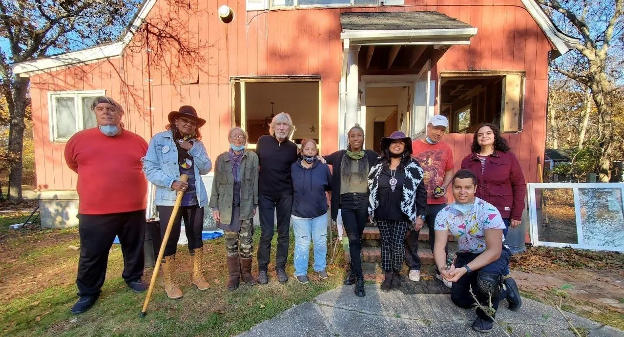 Ma's House with friends, family and Shinnecock founding artist Jeremy Dennis (kneeling) Courtesy Christian Weaver