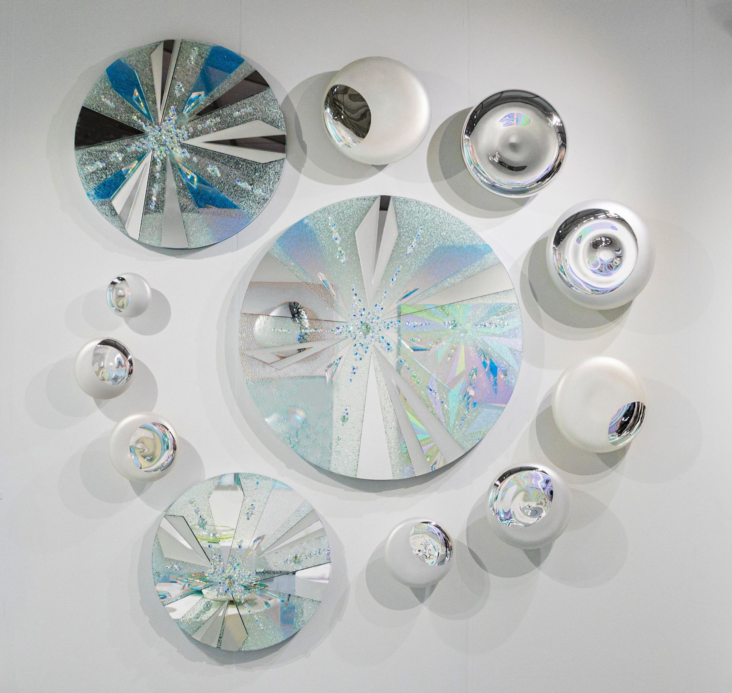 Abby Modell "Starburst Crackle Moon Phases" (glass mirror assemblage, 10’ x 10’)