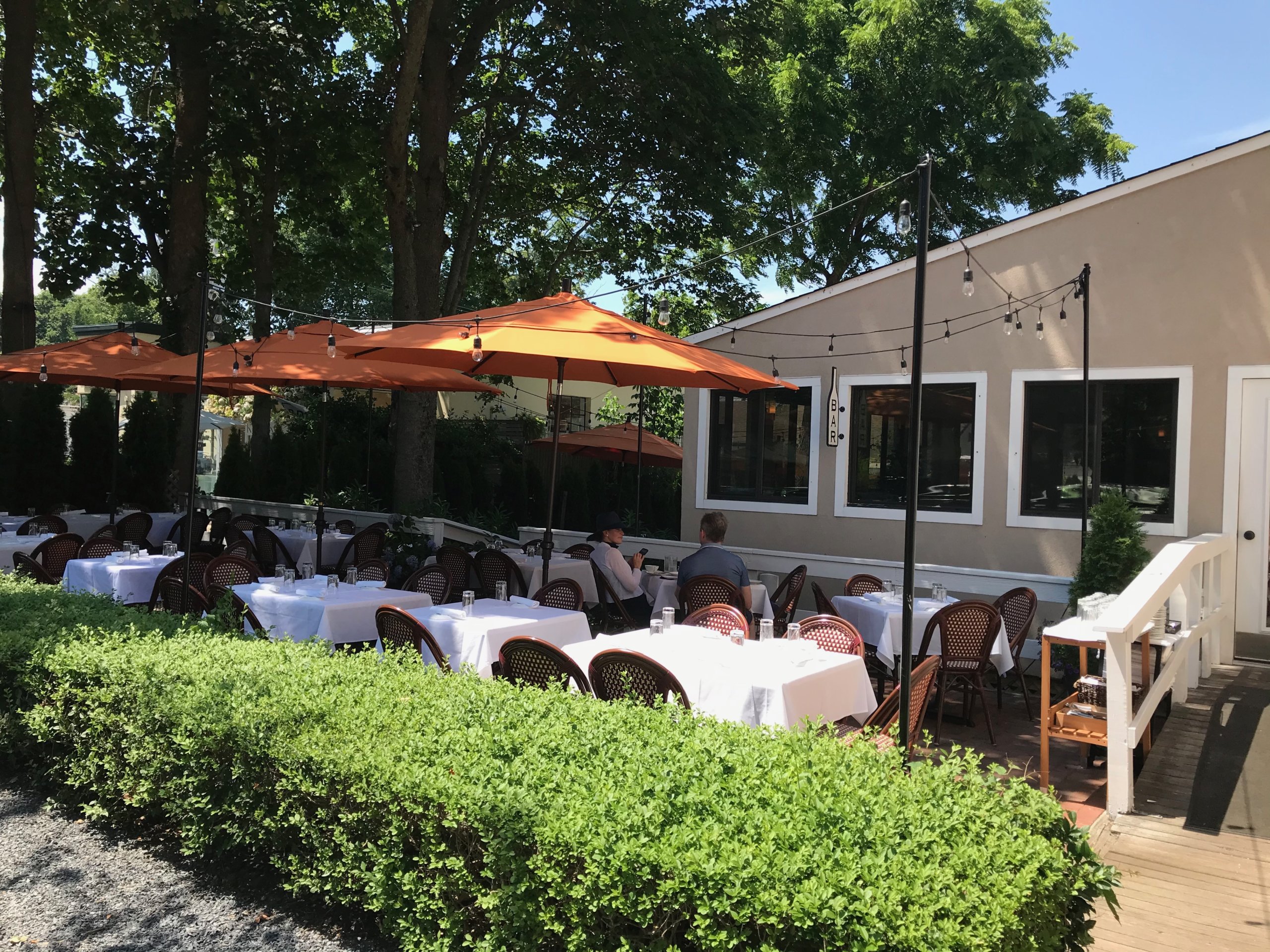 Outdoor tables at Dopo Il Ponte in Bridgehampton