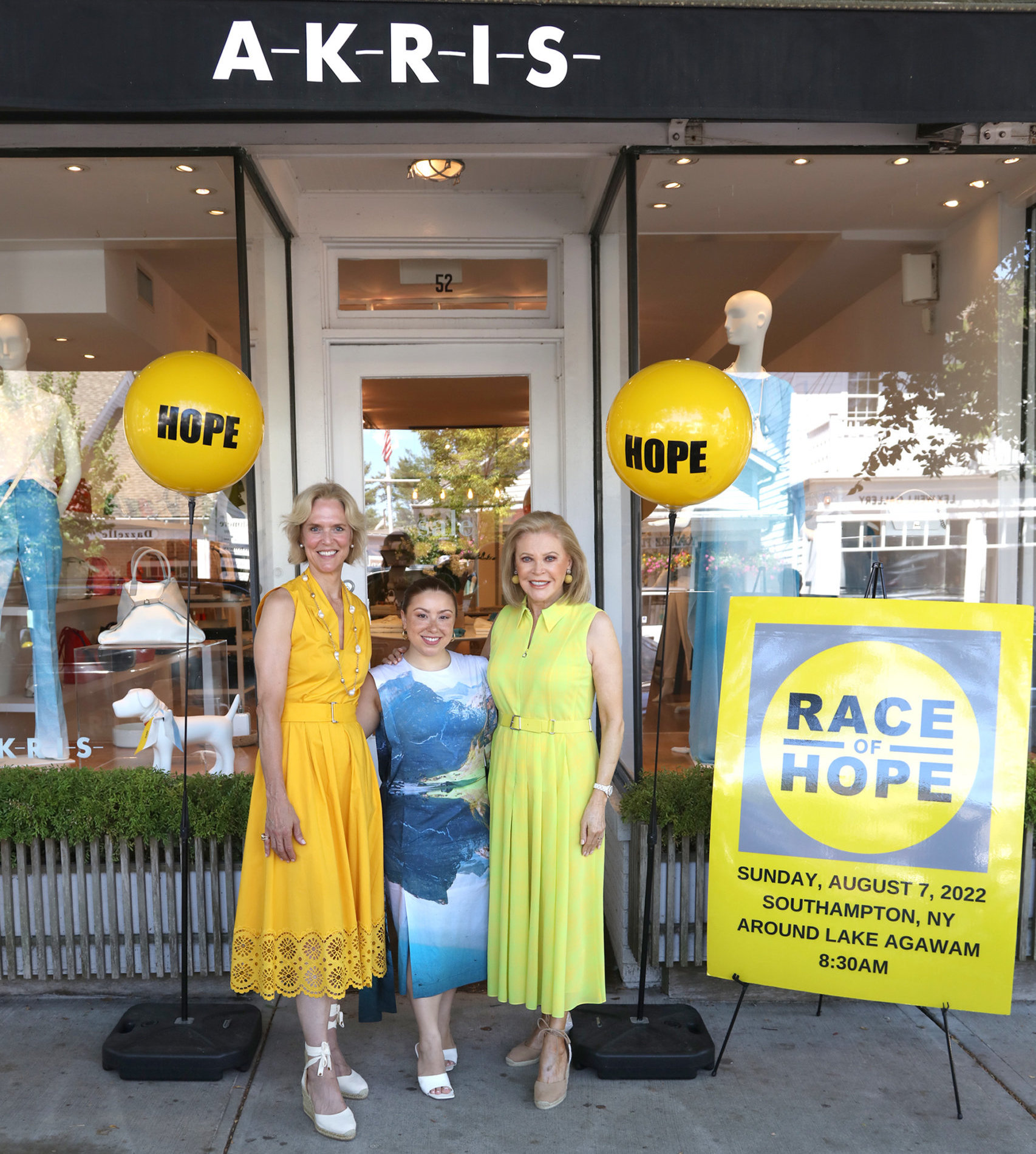 Louisa Benton, Katie Walsh, Audrey Gruss launch the Week of Hope in Southampton with Race of Hope signs