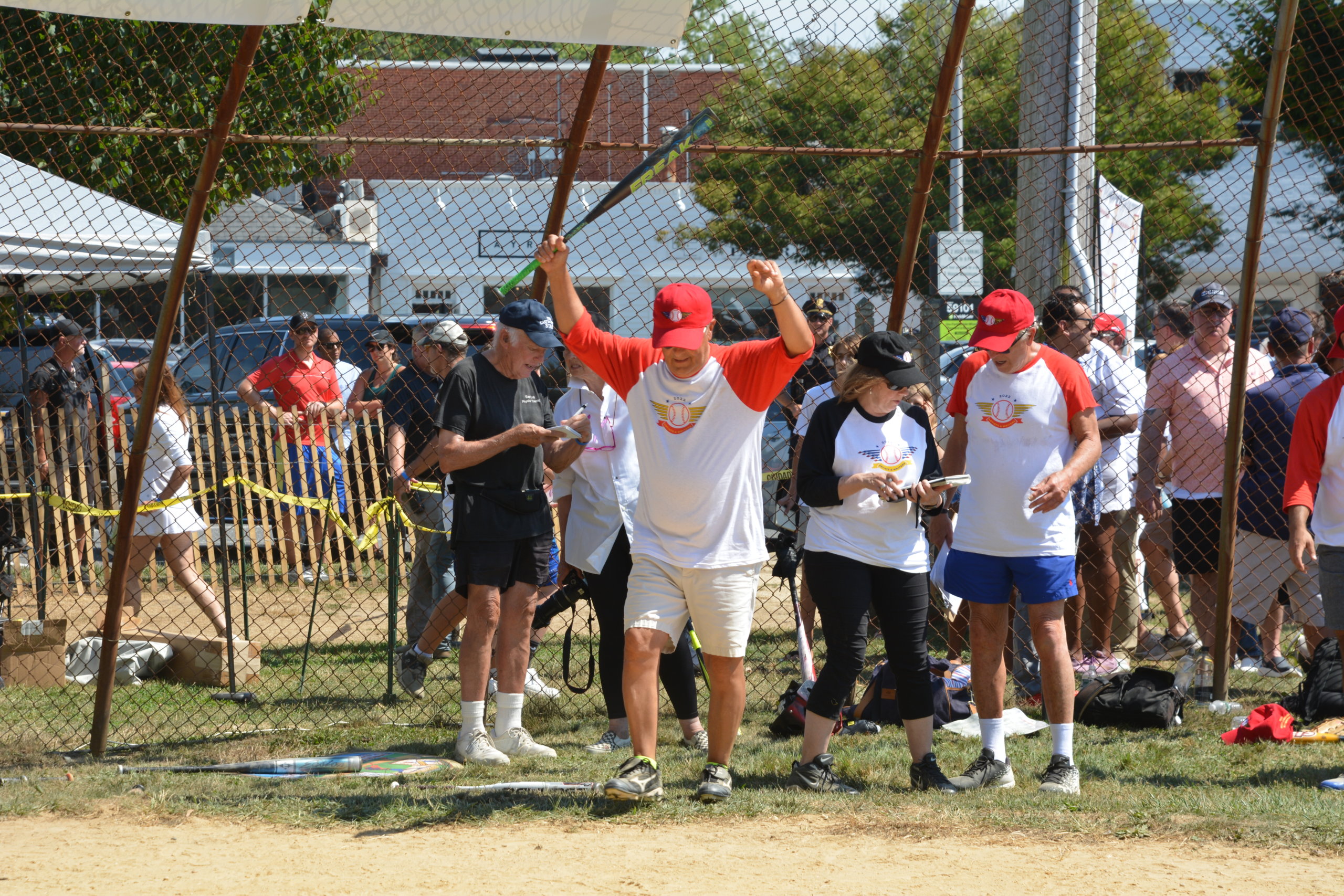 Mike Lupica at bat at the 2002 Artists & Writers Game