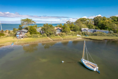 06_97-Louse-Point-Rd-East-Hampton_Aerial-Rear_1-1024×682-1
