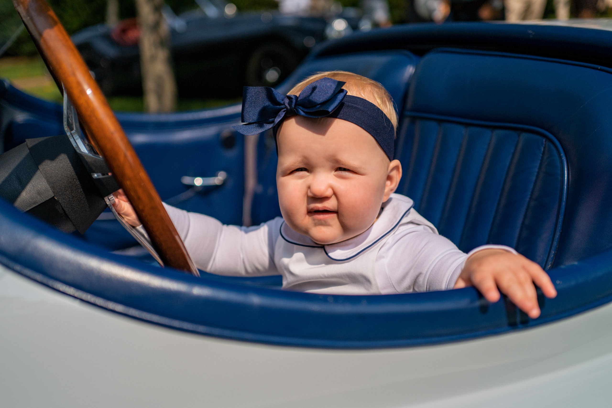 Jaguar XK120 with Peter Ostrega & Samantha Anglelilli's baby at Topping Rose House in BridgehamptonJaguar XK120 with Peter Ostrega & Samantha Anglelilli's baby at Topping Rose House in Bridgehampton