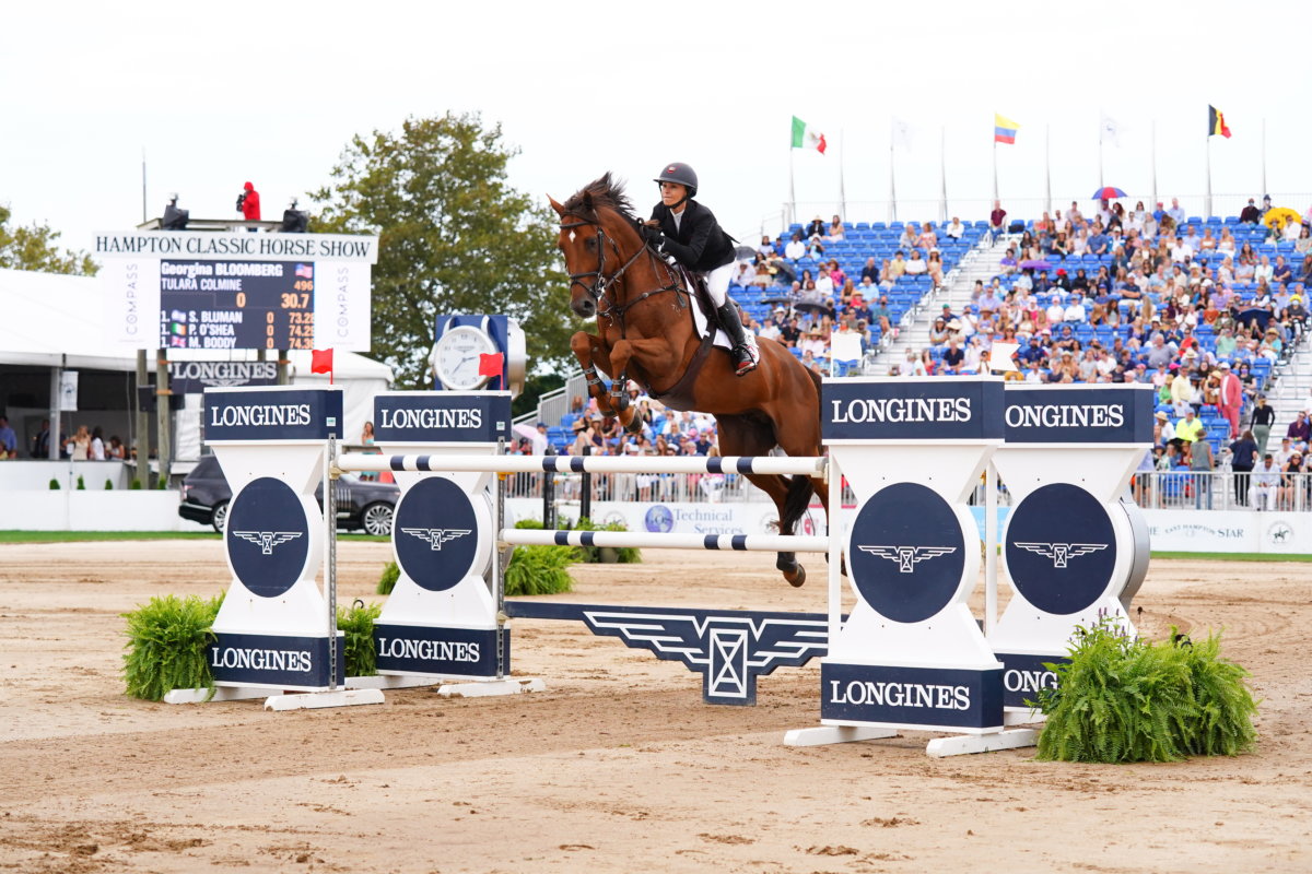 Georgina Bloomberg and her horse Tulara Colmine jump at the 2021 Hampton Classic