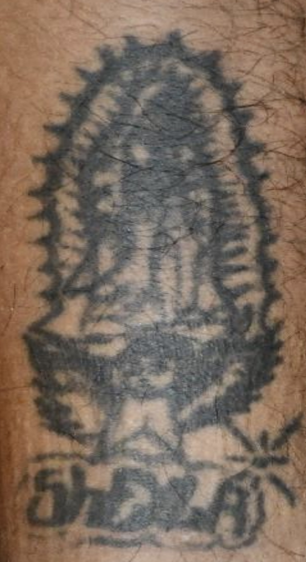 The pedestrian who was fatally struck by two cars in Flanders had a Virgin of Guadalupe tattoo on his left outer calf.
