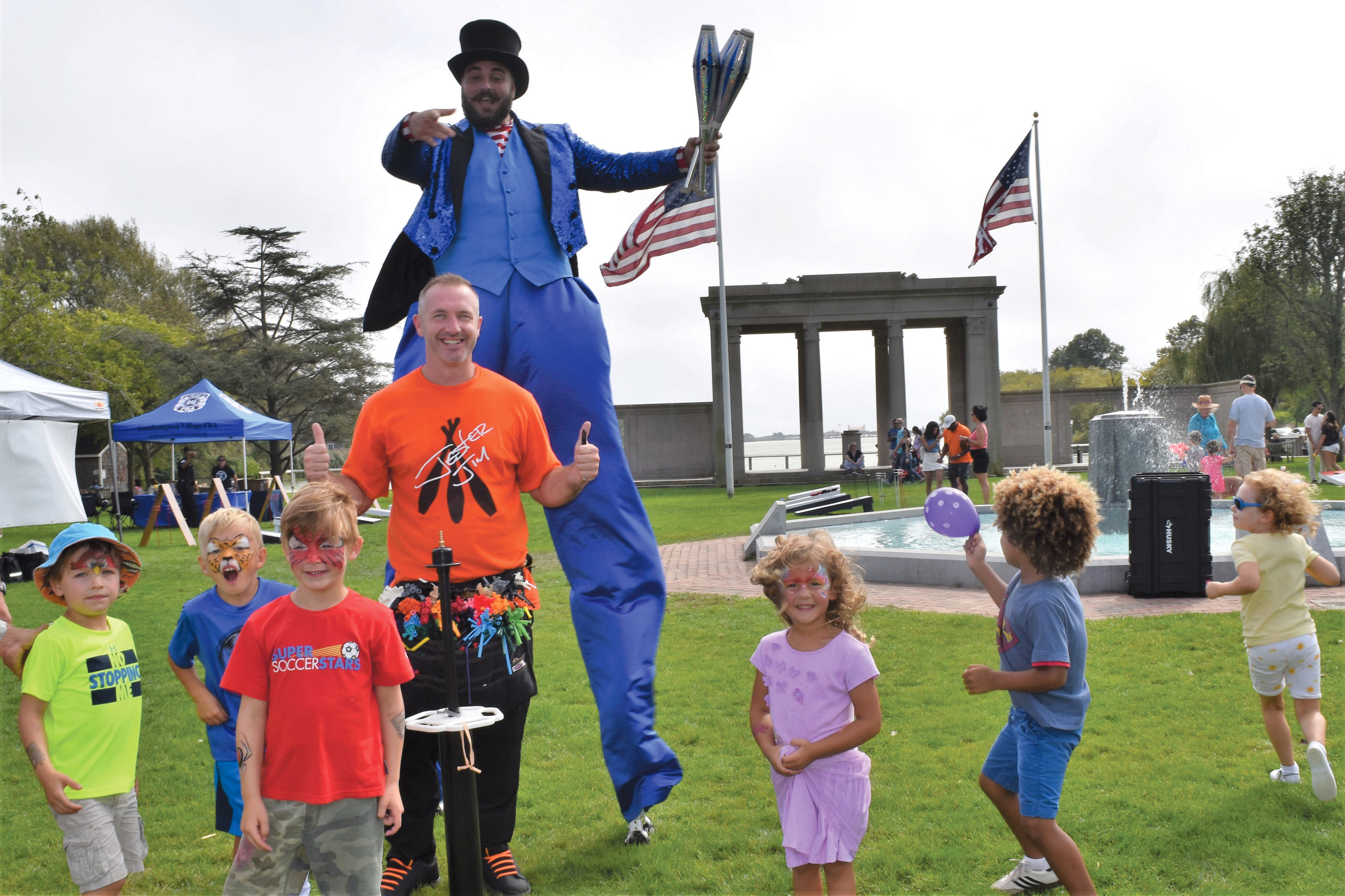 Stiltwalker and Jester Jim group at SouthamptonFest