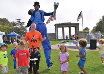 Stiltwalker and Jester Jim group at SouthamptonFest