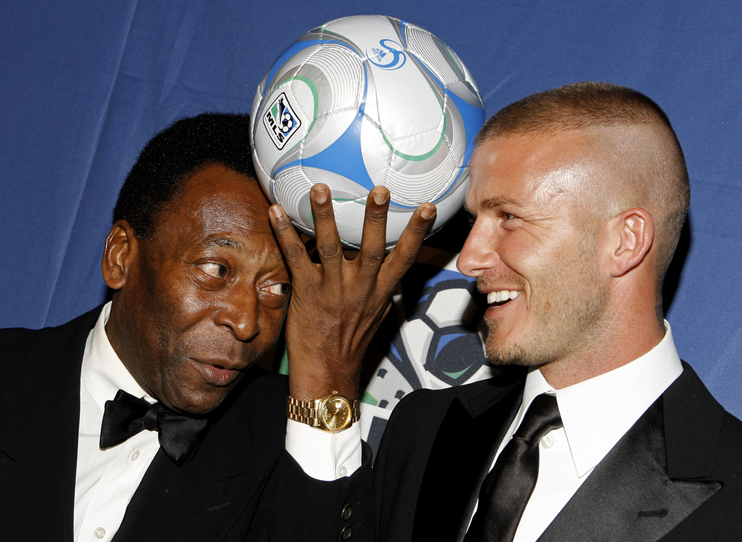 Pelé and English soccer star David Beckham pose for photos during a U.S. Soccer Foundation fundraising gala, in New York, March 19, 2008