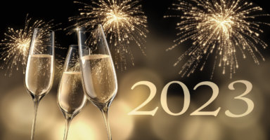 2023 - New year's eve composition with champagne glasses and fireworks - 3D illustration