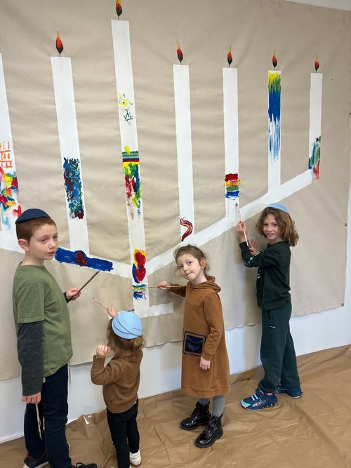 Kids paint the Unity Menorah at the Center of Jewish Life — Chabad in Sag Harbor