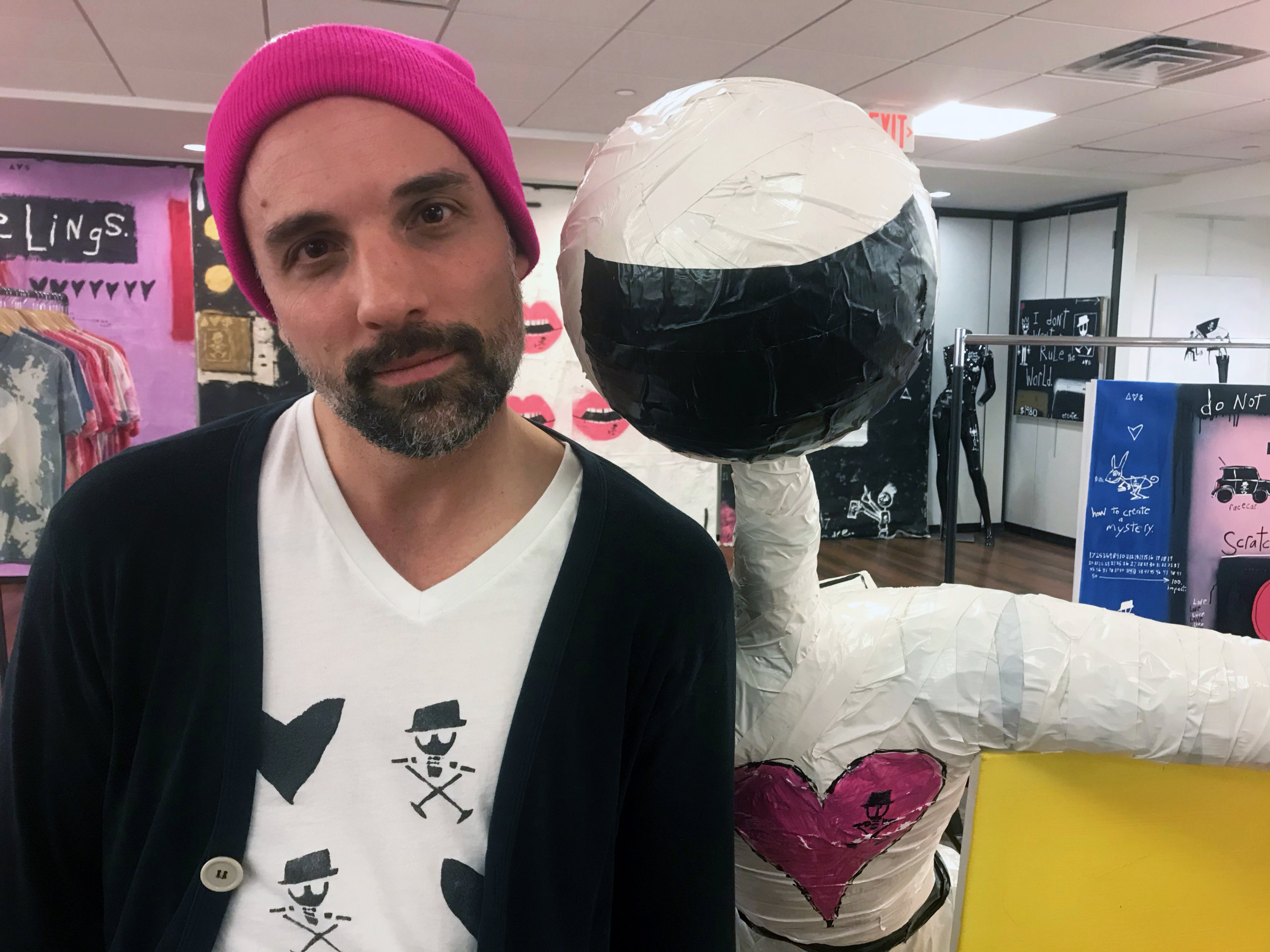 Adam Baranello with his "Spaceman" sculpture in A Room Full of Art at Southampton Cultural Center