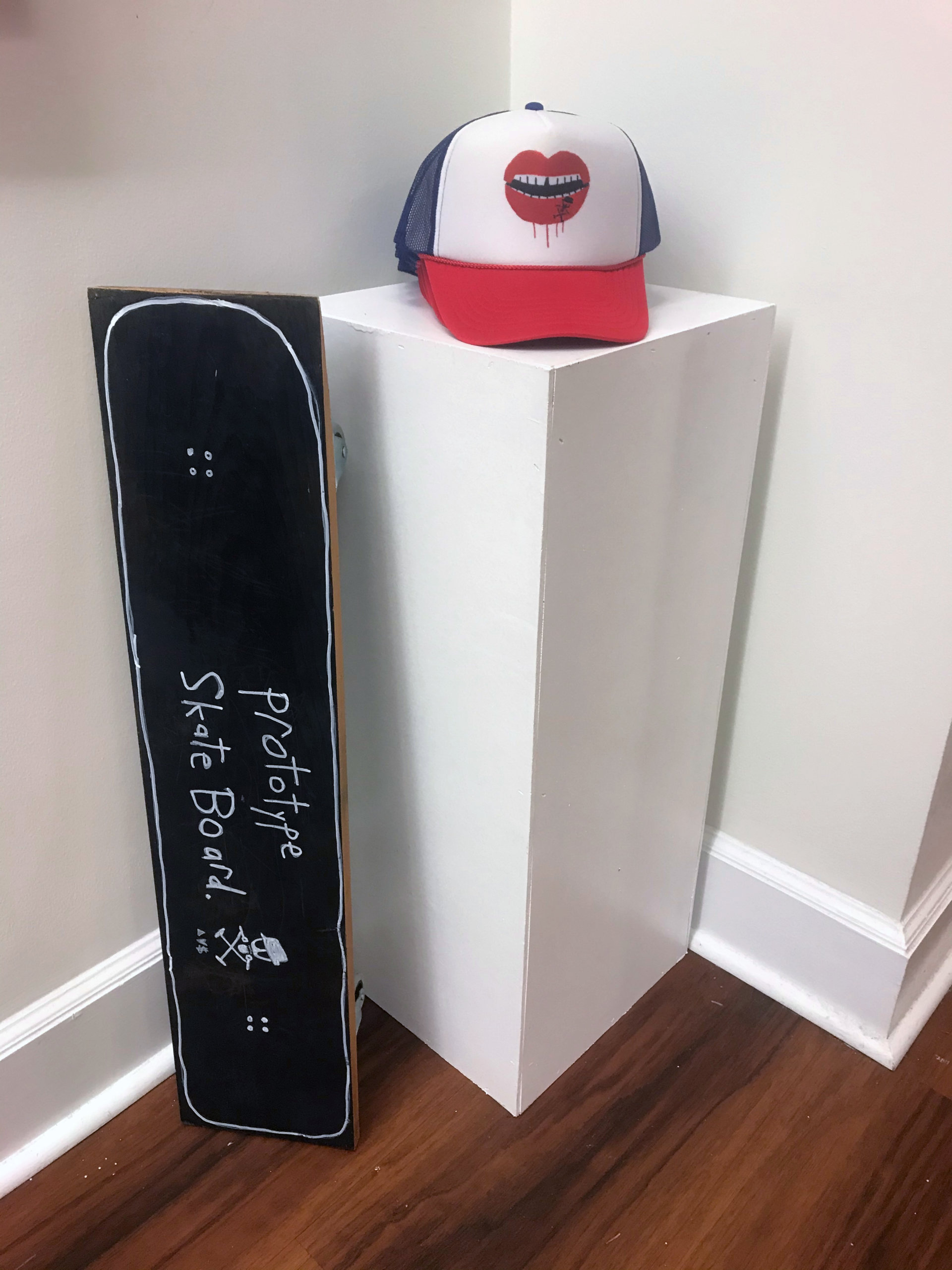 Hat and skateboard sculpture in Adam Baranello's "Room Full of Art"