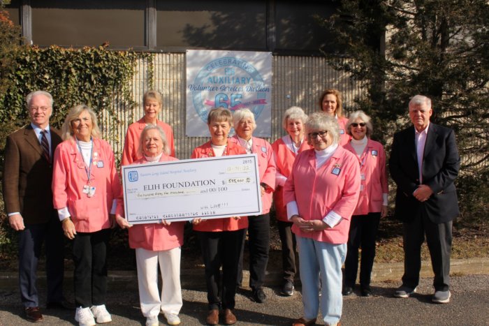 Stony Brook Eastern Long Island Hospital Auxiliary shows off a giant donation check