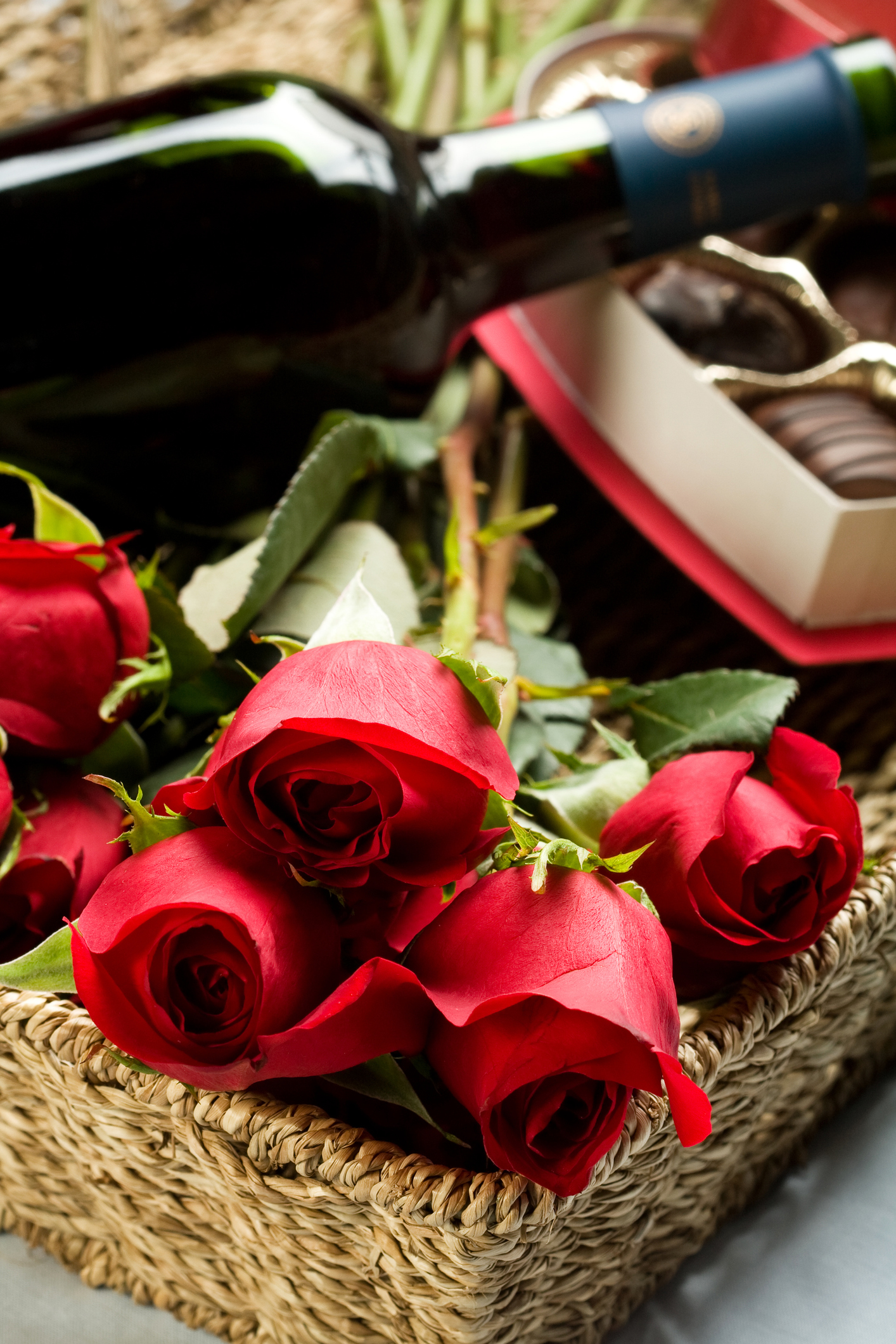 Roses, Wine and Chocolates in a large wicker tray