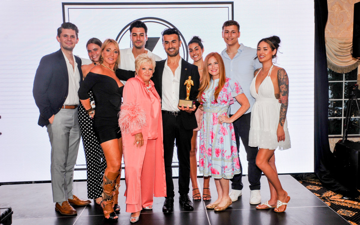 Victoria Schneps and Elizabeth Schneps-Aloni with 75 Main owner and "Serving the Hamptons" star Zach Erdem and his team celebrating their Power List honor