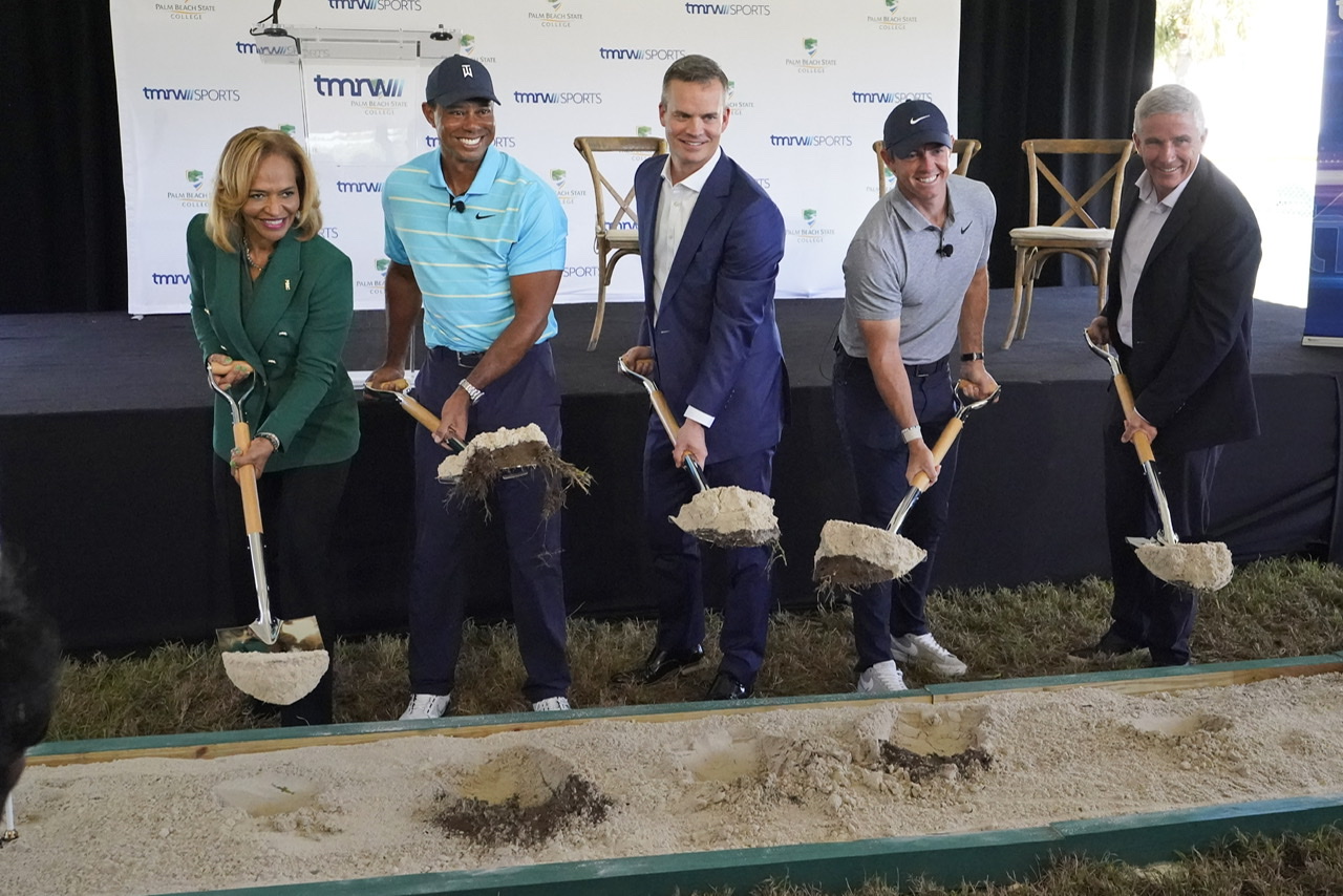 Tiger Woods, second from left, and Rory McIlroy, second from right, join others in breaking ground for the future home of a new tech-infused golf league