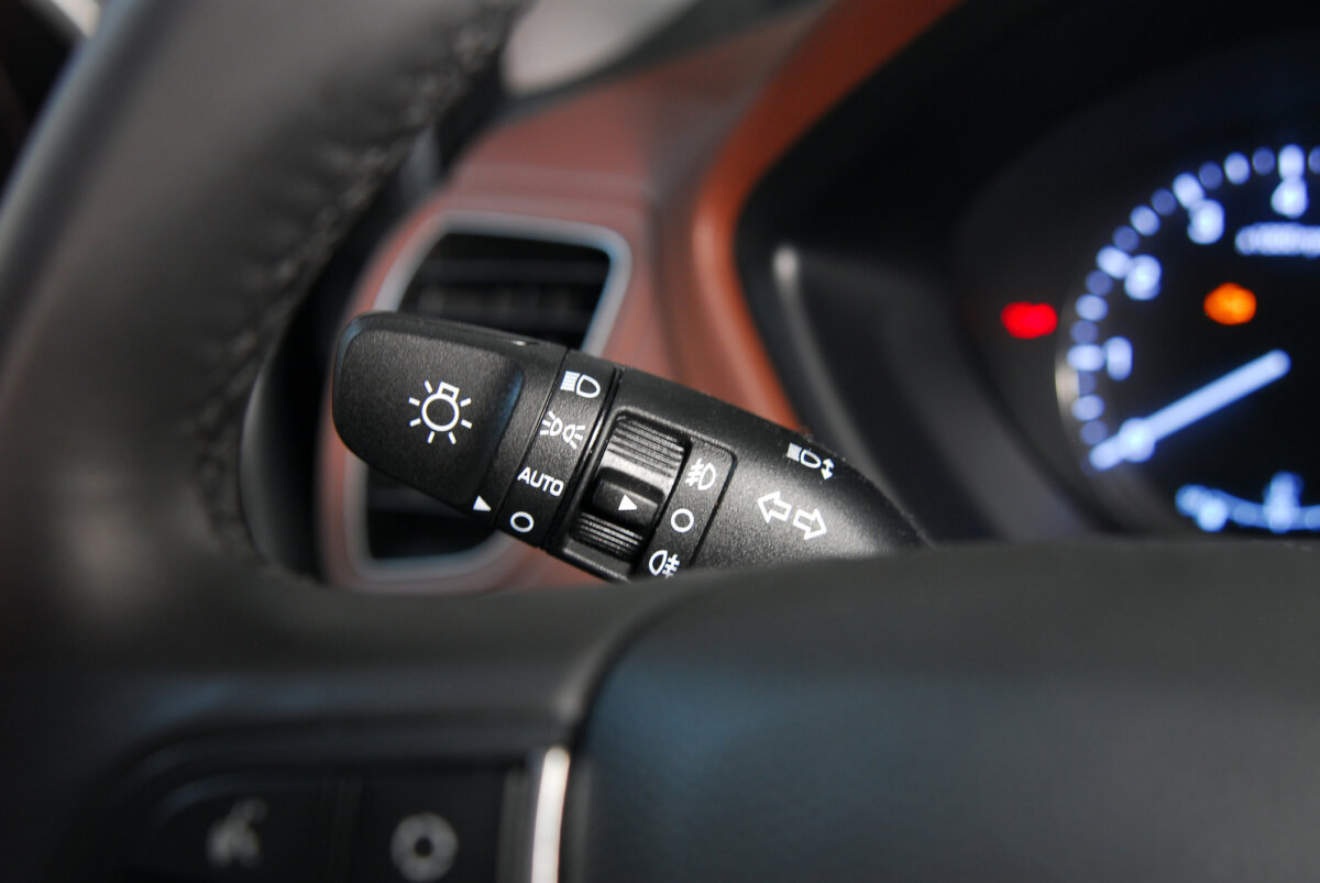 Closeup image of car lighting control switch blinker left turn signal