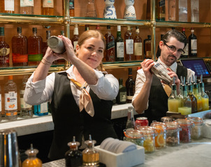 Bartenders Emily Slavin, Sean Kelleher at the Enchante Grand Opening