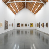 Installation View of Artists Choose Parrish, Part I B, featuring work by Claude Lawrence (left wall) and Eric Fischl (right and rear walls) shown with collection works selected by the artists. Photo: Gary Mamay