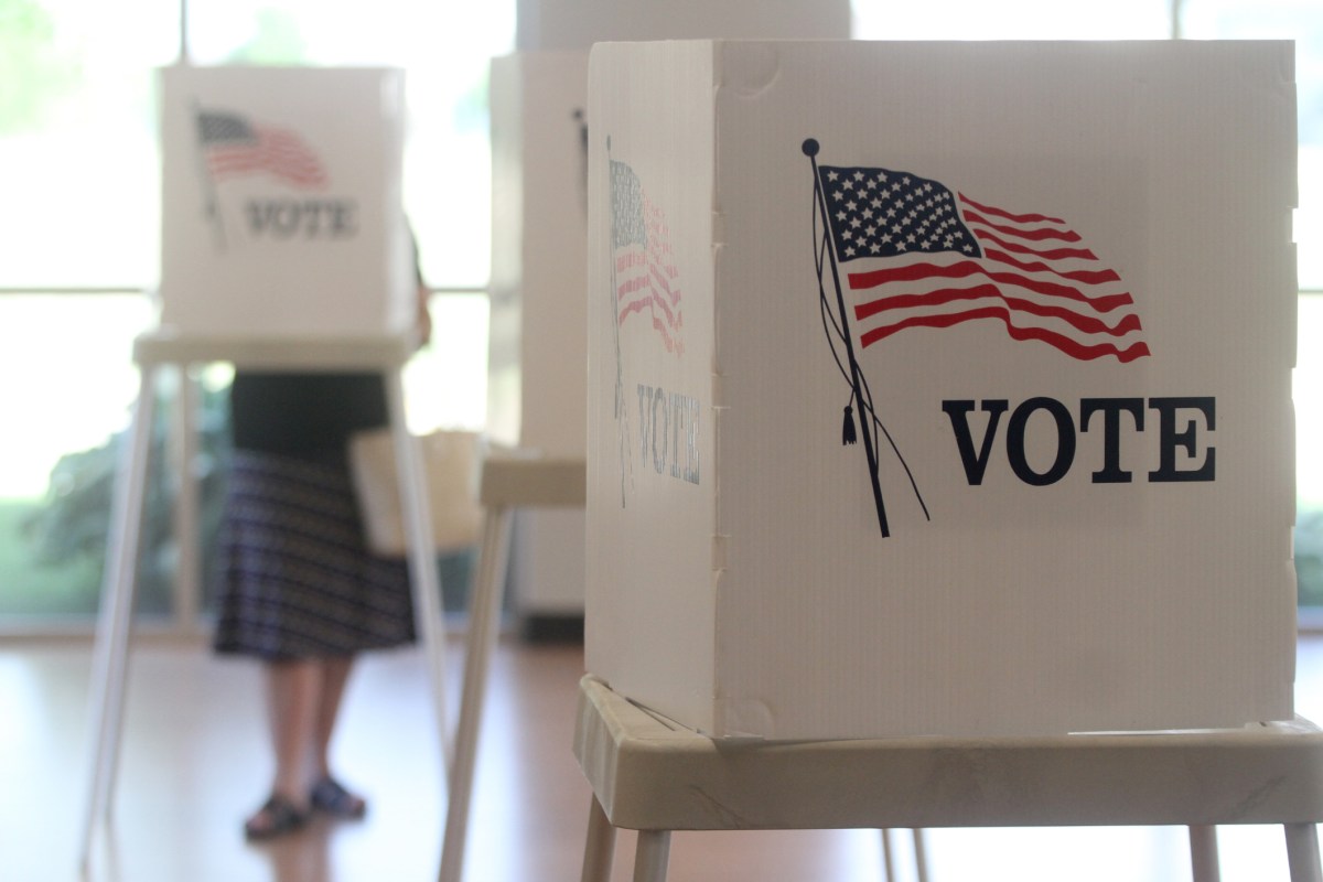 Voting booths stand ready for use in a U.S. elections. Early voting starts soon