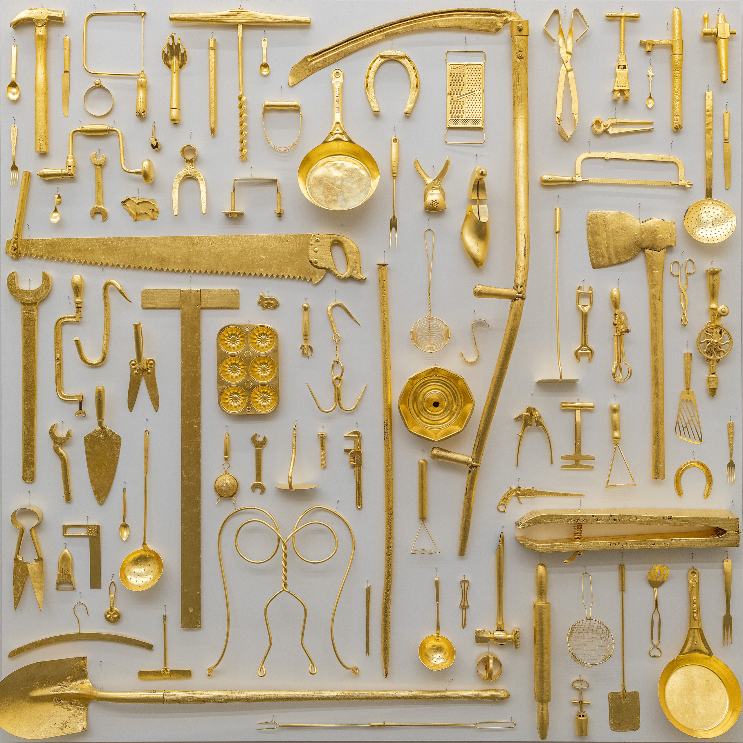 Ugo Rondinone, the alphabet of my mothers and fathers A - Z, 2022 gilded farmers tools. Courtesy of the artist and Gladstone Gallery