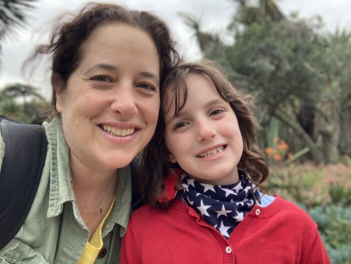 Abby Russell of Sticks and Stones comedy with her daughter, Aria