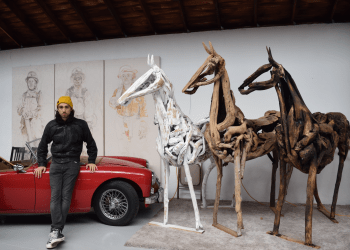 Fire artist Franco Cuttica with his sculptures made of driftwood is appearing at North Fork Table & Inn