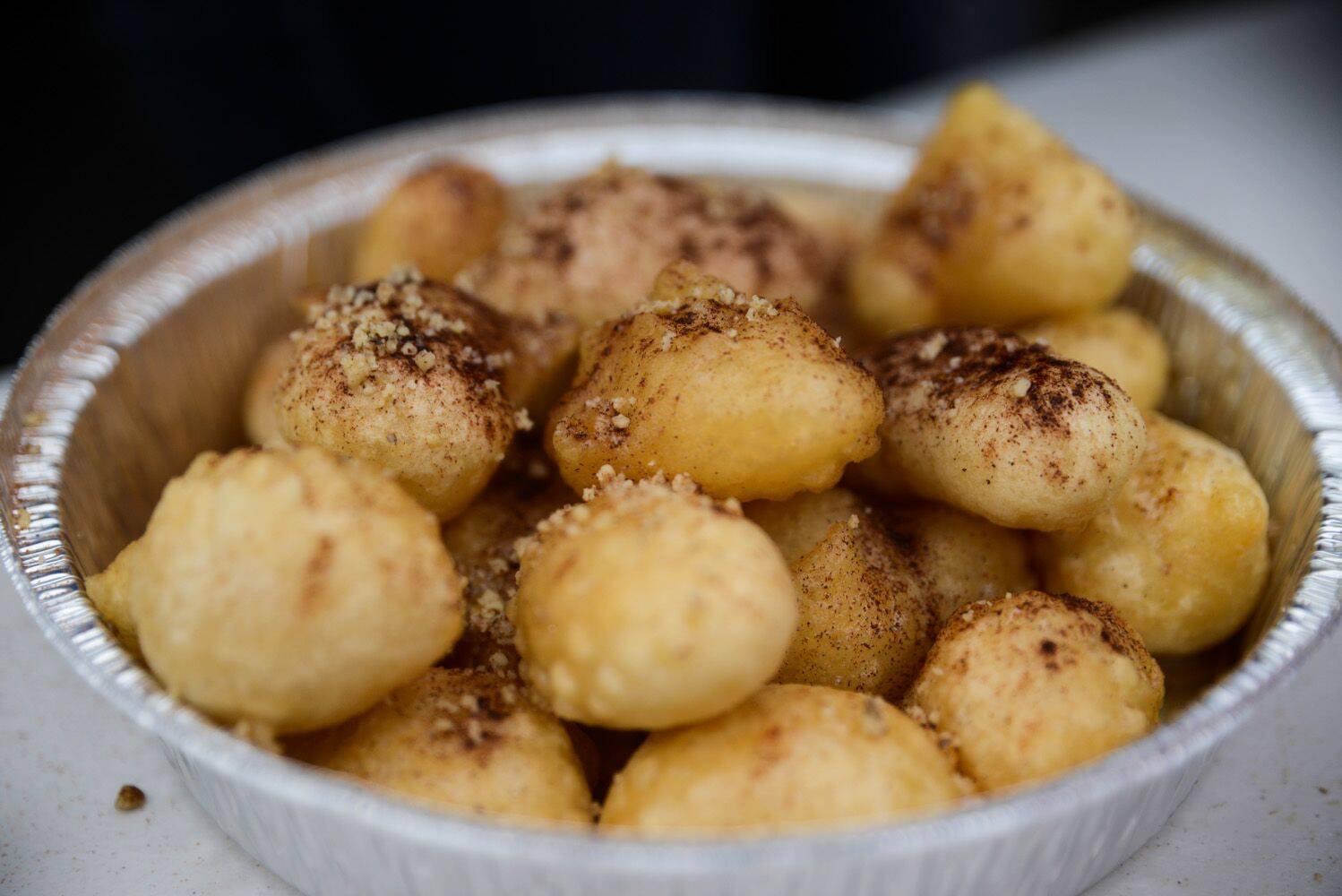 At the A Taste of Greece Festival - Loukoumades are Greek donut holes drizzled with honey.