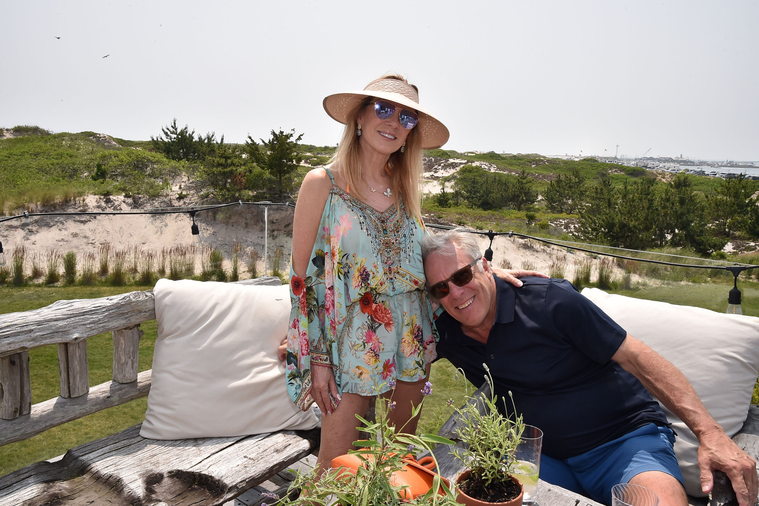 Ramona Singer and William Kent canoodle at Eugenia Bullock's 25th birthday party in Water Mill