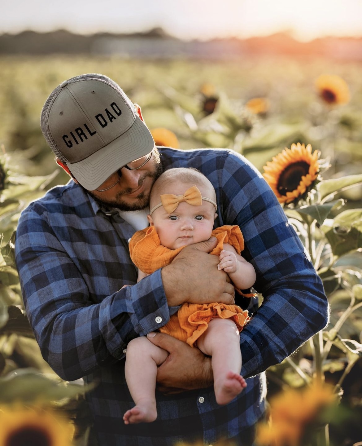 Father daughter in sunflower farm Waterdrinker farms Sunflower Fest