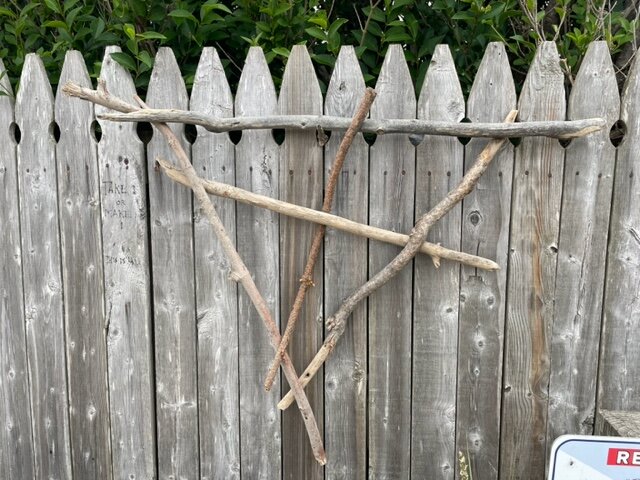 Sculpture by George Mittendorf hanging at Town Line Beach