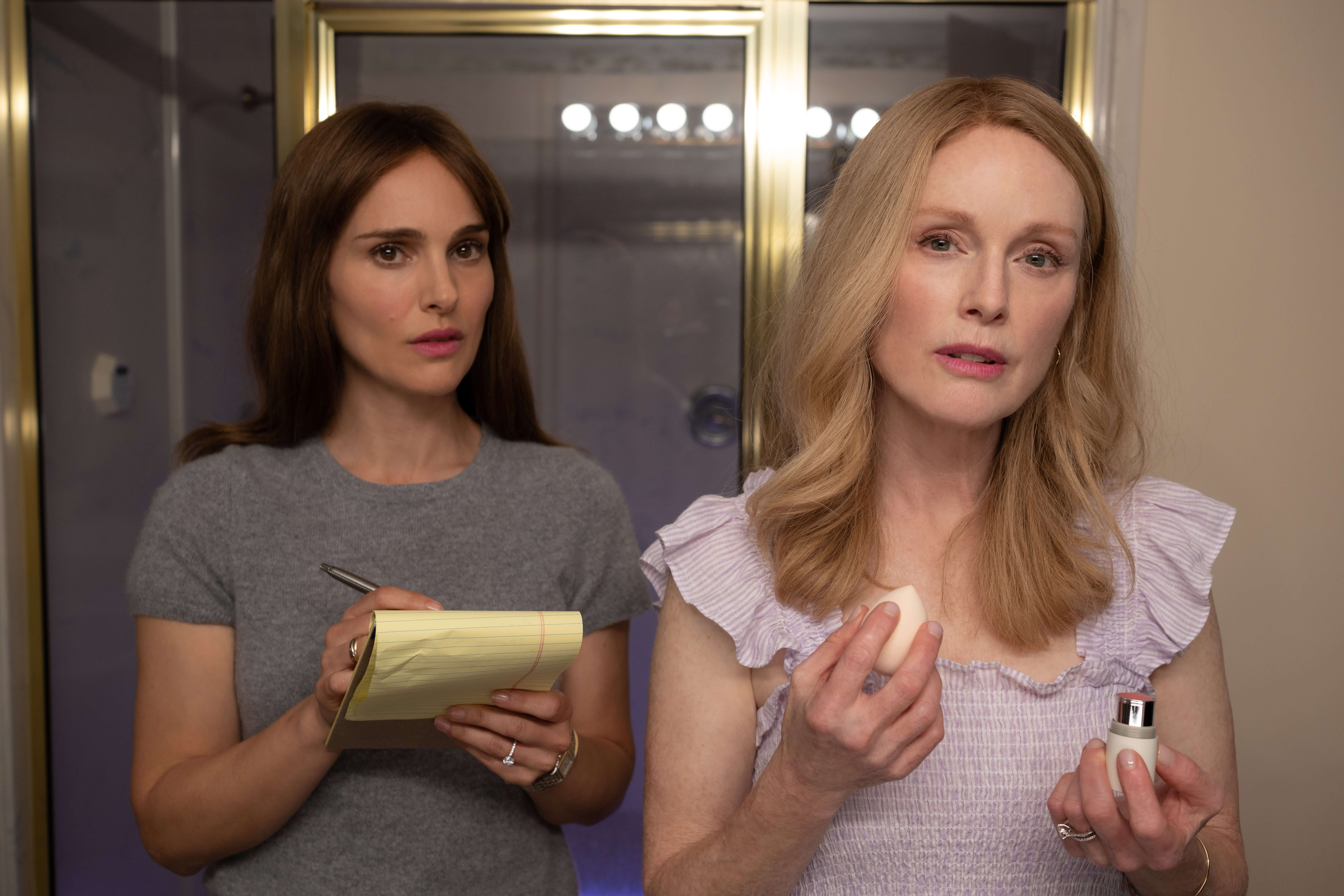 May December. (L to R) Natalie Portman as Elizabeth Berry and Julianne Moore as Gracie Atherton-Yoo in May December. Cr. Francois Duhamel / courtesy of Netflix
