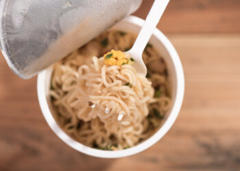 Noodle Cup,noodle ramen soup in a cup,on wooden background