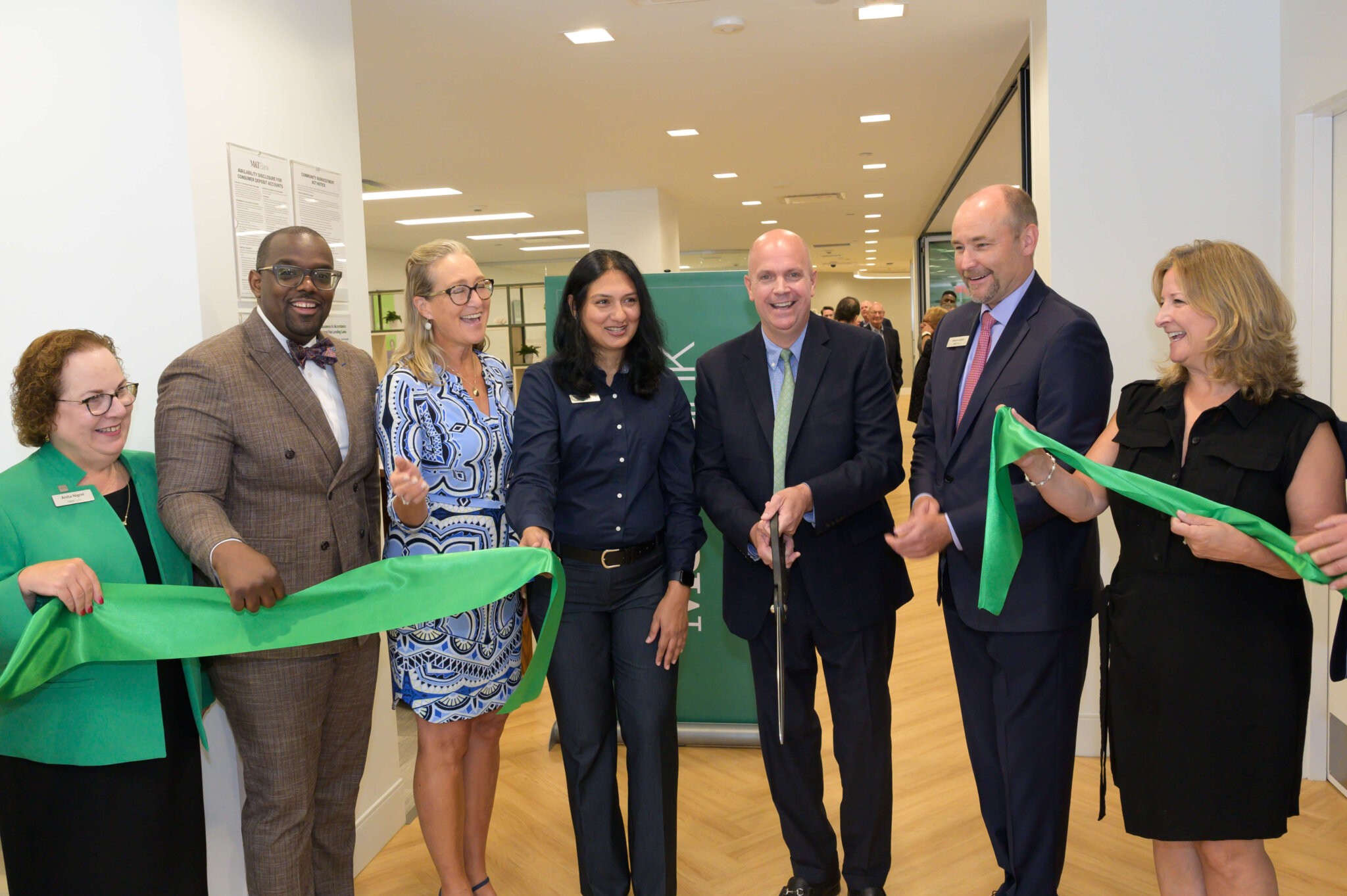 M&T Bank recently cut the ribbon on its new Advice & Guidance Center on Main Street in Westhampton Beach, Anita Nigrel, Quincy Kingston, Bridget Fleming , Shaista Khalid, Stan Glinka, Jason Lipiec, Mayor Maria Moore, RIck Reustle (Rick Seigleman)