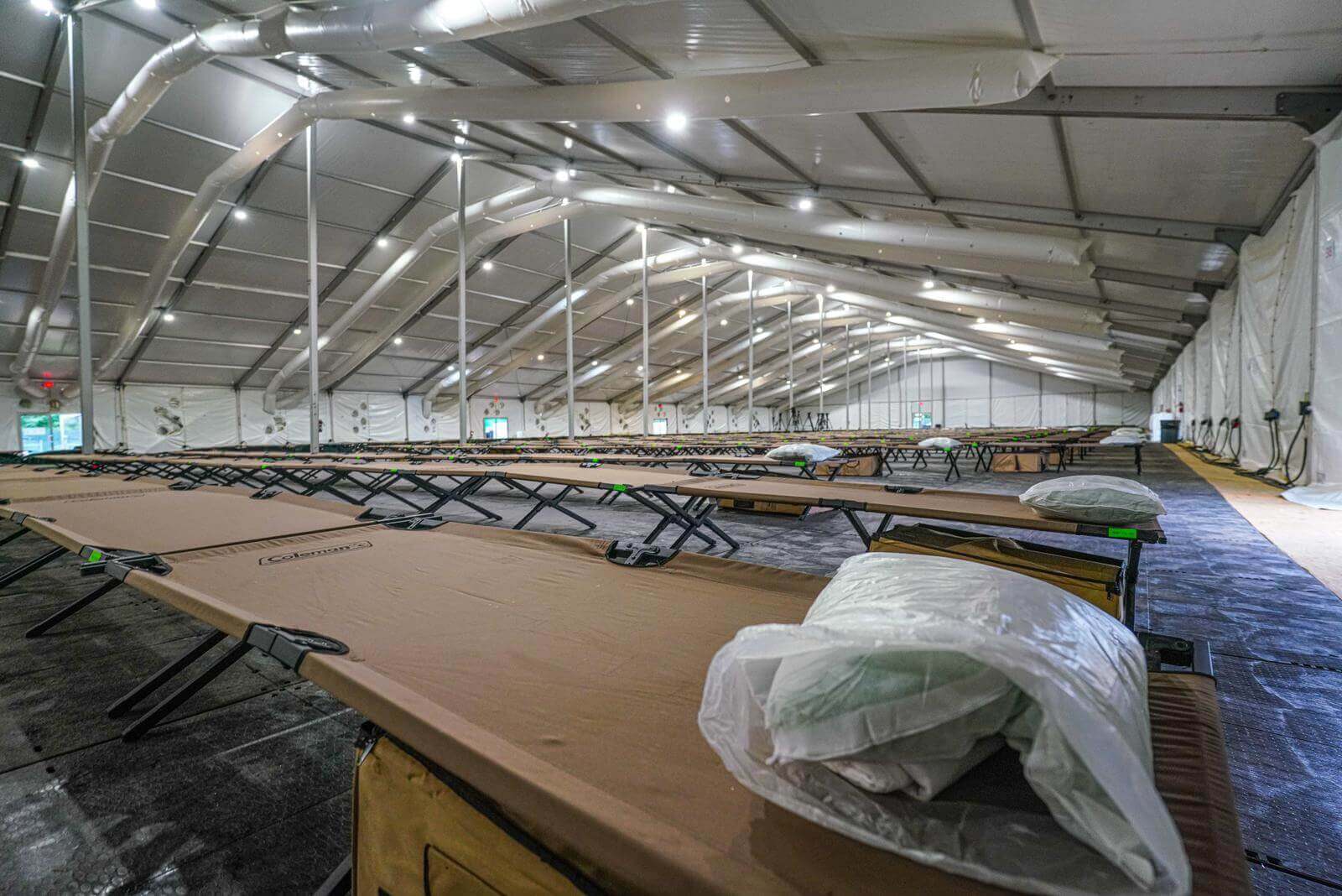 Cots inside the makeshift shelter for migrants erected on the grounds of the Creedmoor Psychiatric Center in Queens on Aug. 15, 2023