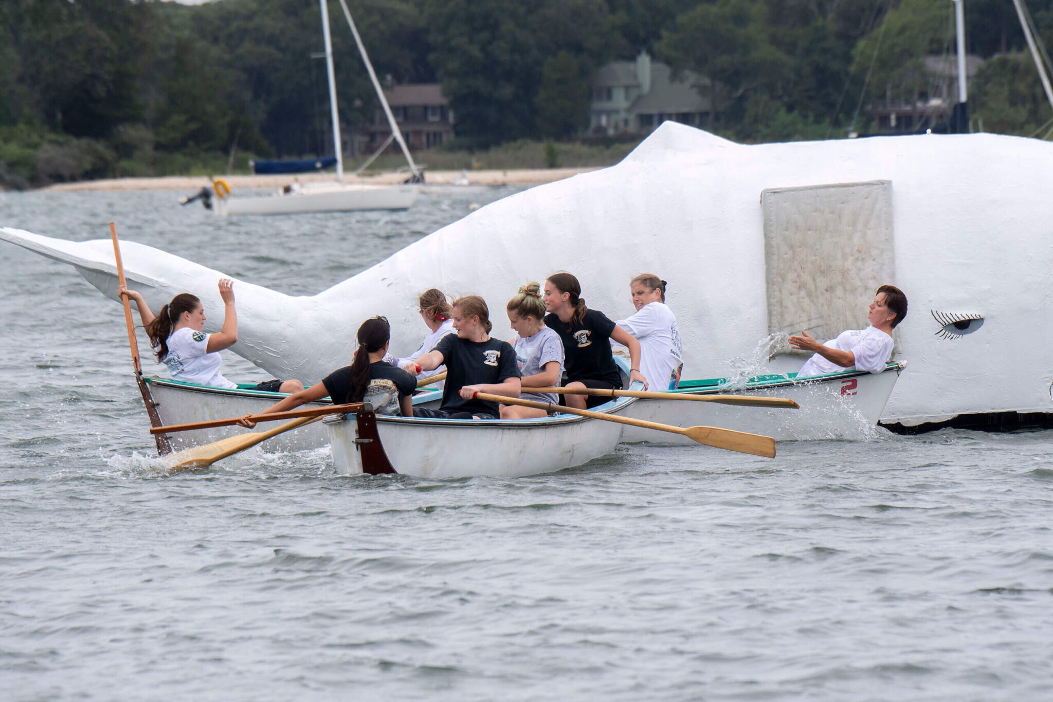 The Corner Bar and Lady Whalers women's whaleboat teams competing at HarborFest 2018