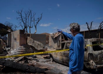 A Lahaina resident looks at his house for the first time after the wildfire in August, on September 26, 2023. Maui Photo: AP Photo/Mengshin Lin