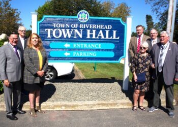 Ed Romaine, Yvette Aguiar, Town Board Members with Emilie Roy Corey at the Riverhead Town Hall Ribbon Cutting
