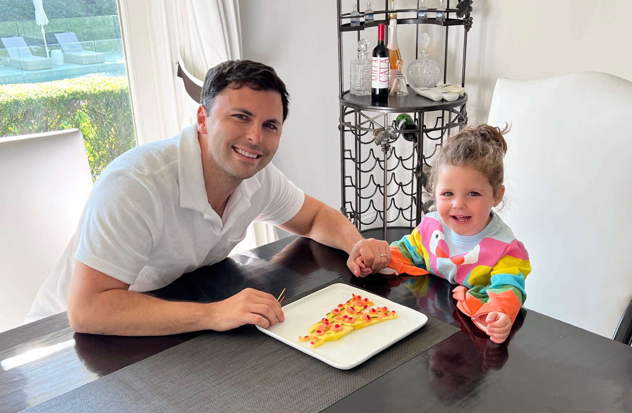 Harley Langberg and his daughter Blake make pizza out of other food