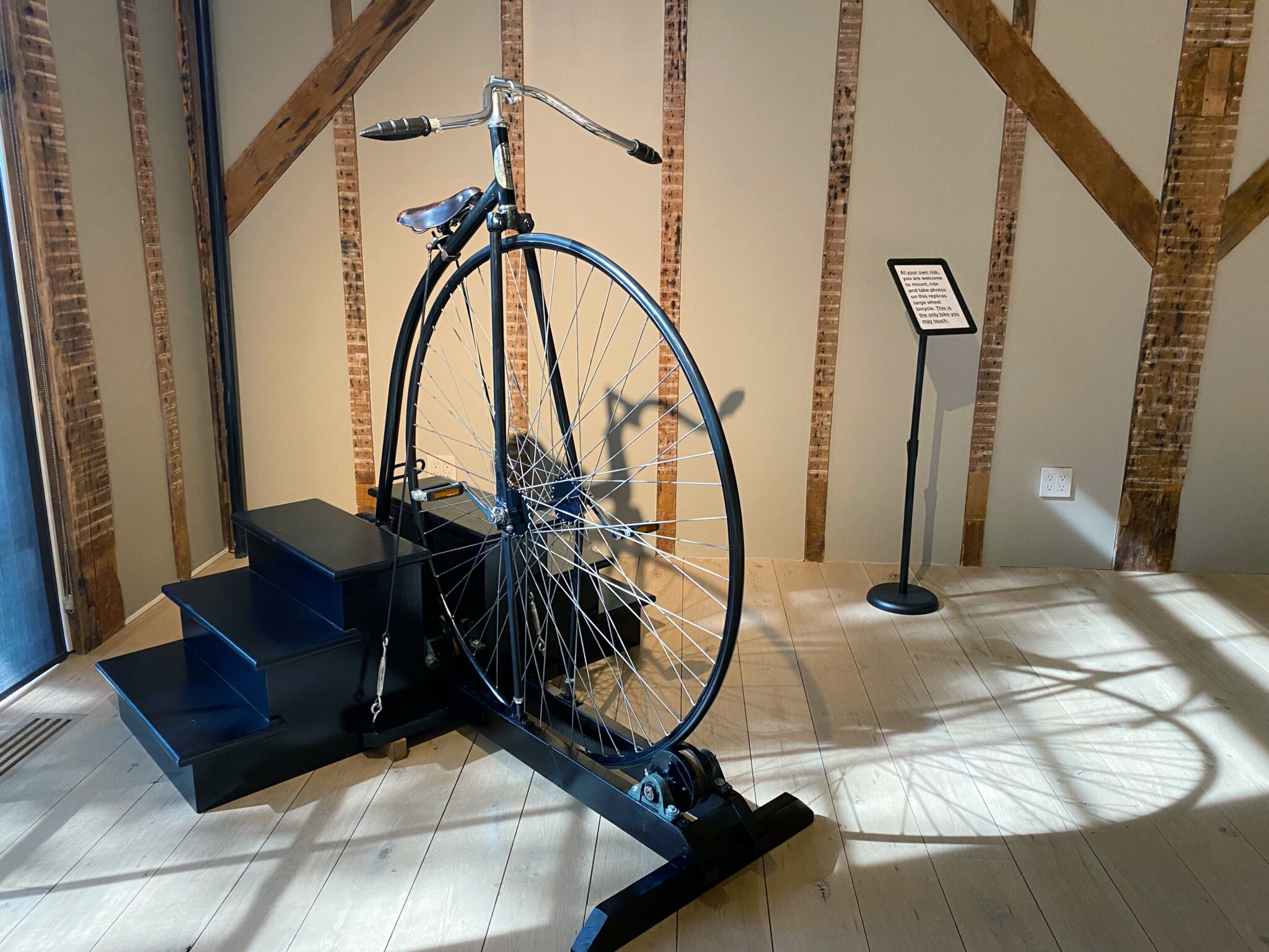 Replica 1880-90s Penny-farthing or High-wheel bicycle at The Church in Sag Harbor in the Hamptons