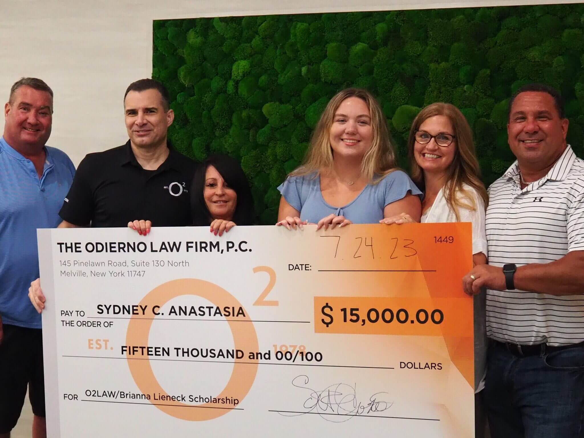Cancer survivor Sydney Anastasia presented with the Brianna Lieneck Memorial Scholarship Award