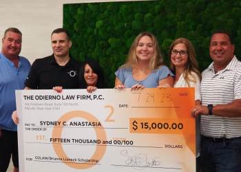 Cancer survivor Sydney Anastasia presented with the Brianna Lieneck Memorial Scholarship Award