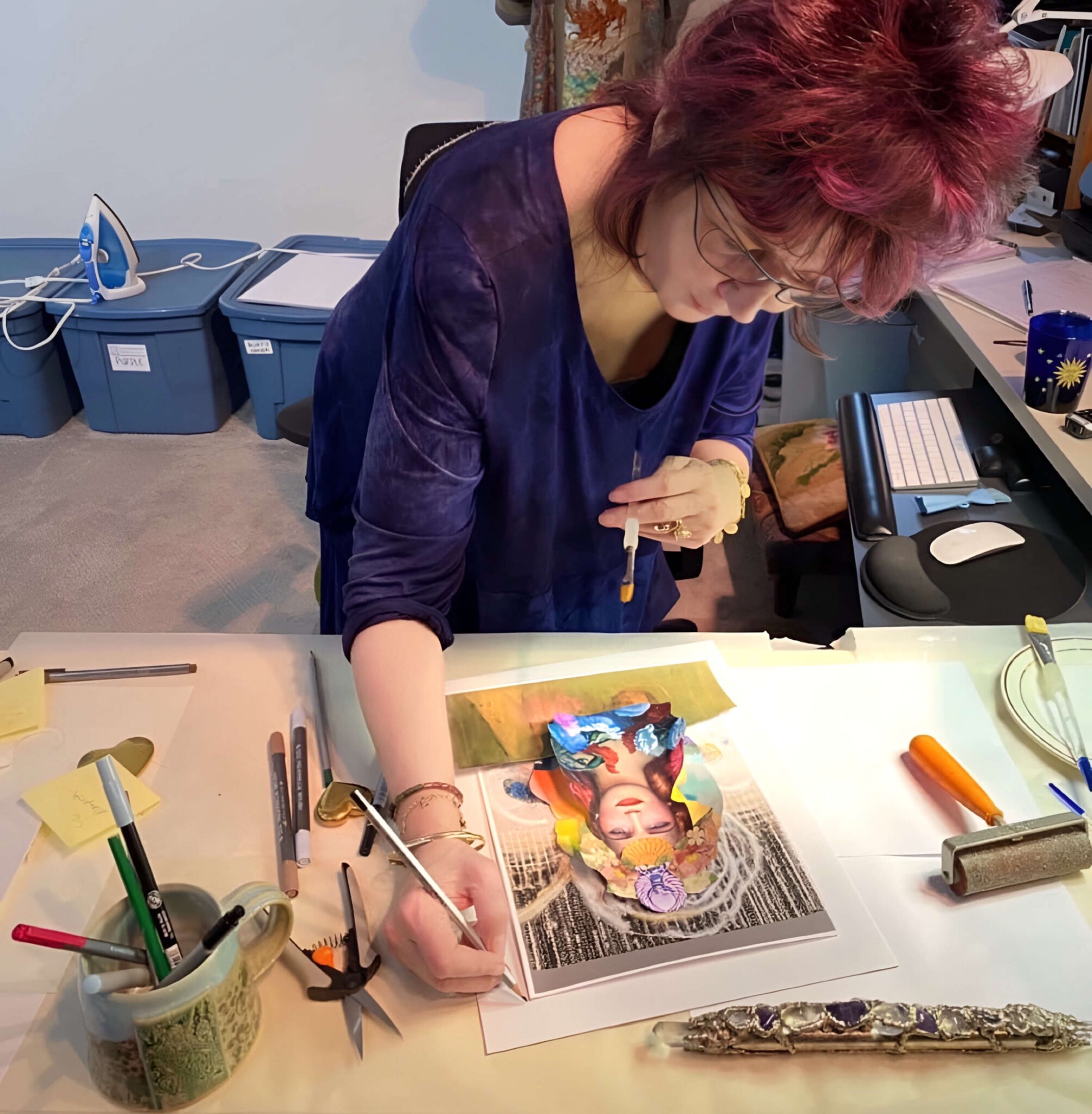 Amy Zerner creating a collage painting